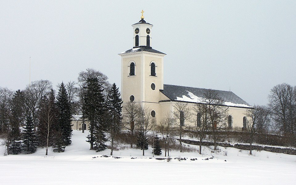 Kuddby, Vikbolandet, Sweden: the parish church and its surroundings.