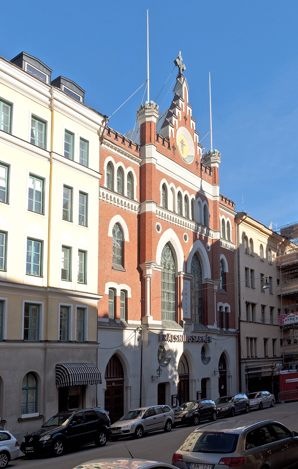 Östermalmsgatan 69, Frälsningsarméns tempel. Byggnadsår 1886-87, arkitekt Adolf Emil Melander (fasad) och Robert Alderin (övrigt) , byggherre Hanna Ouchterlony för Frälsningsarmén, byggmästare R Alder