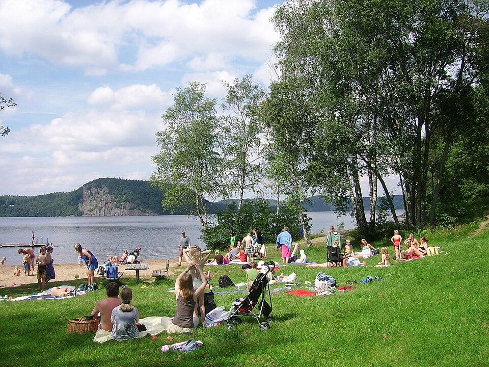 A beach (named Bastevik) by the east side of the lake Hällungen near Ucklum in the Municipality of Stenungsund