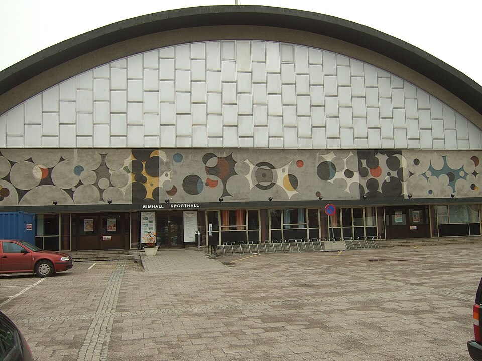 The sports venue "Sporthallen" at Universitetsallén 11 in Sundsvall, main entrance with sgraffito drawing by Pierre Olofsson (1921-1996)